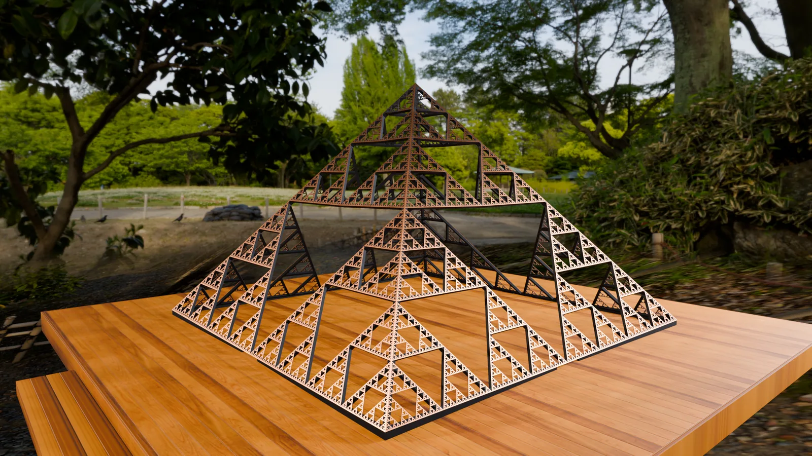 The 1.8 m copper Sierpinski pyramid on a cedar deck in a Japanese garden