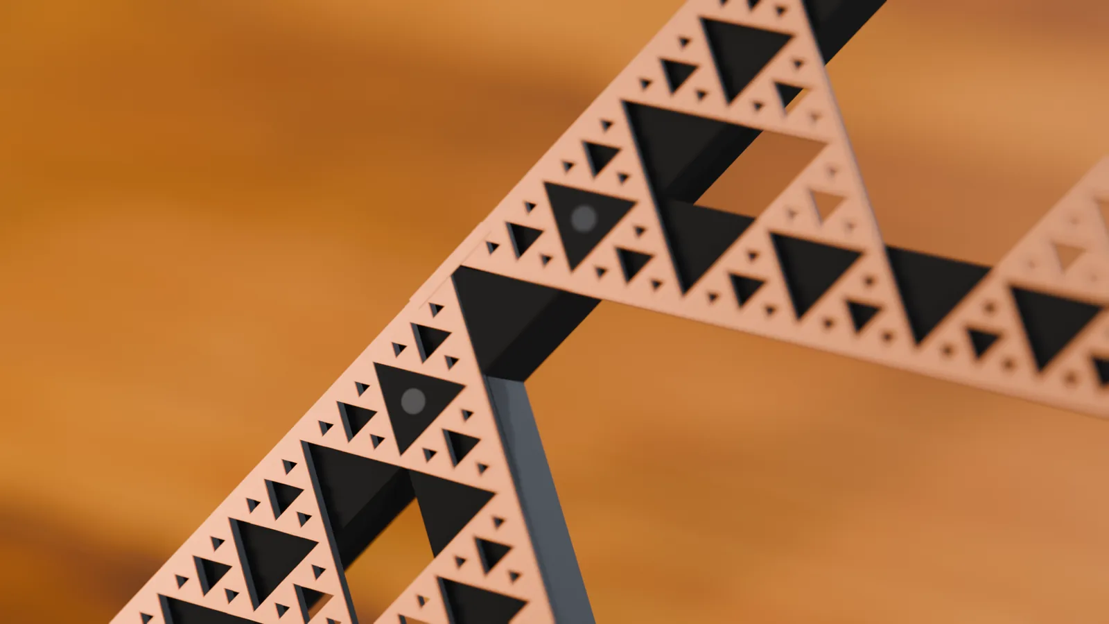 Macro of the copper fractal and clamp screws