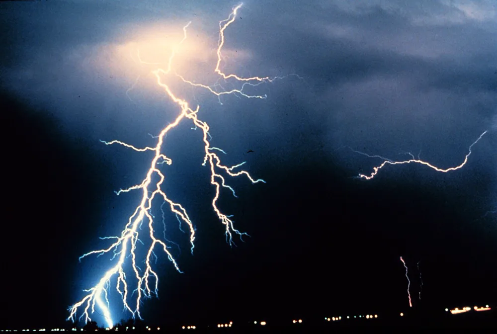 Lightning striking from a storm cloud