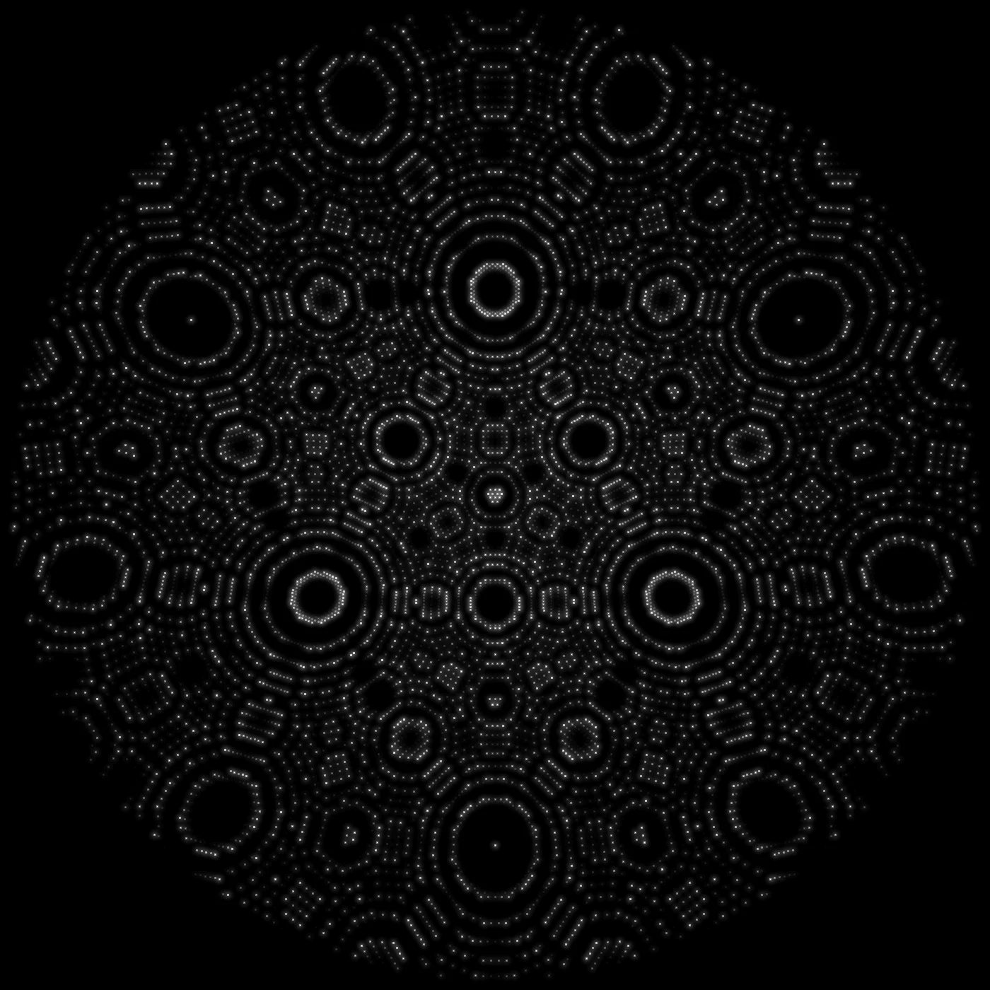Simulated field ion microscope image of an iron crystal seen down its 3-fold axis: concentric rings of atoms around the crystal poles, with a small triangle at the centre